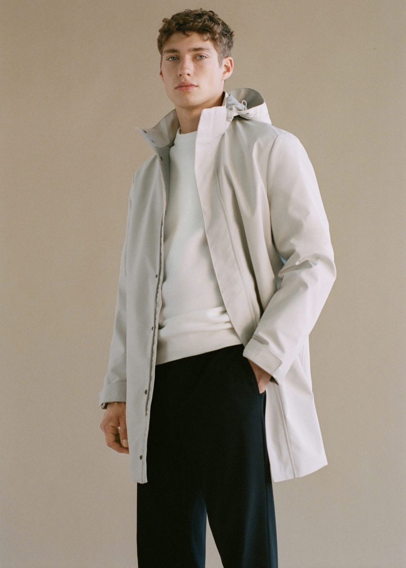 Front and center, Valentin Humbroich sports a breathable waterproof parka and elastic waist cotton pants from Mango Man.