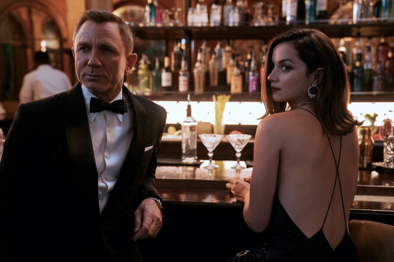 Donning a Tom Ford tuxedo as James Bond, Daniel Craig joins Paloma, played by Ana de Armas in "No Time to Die."