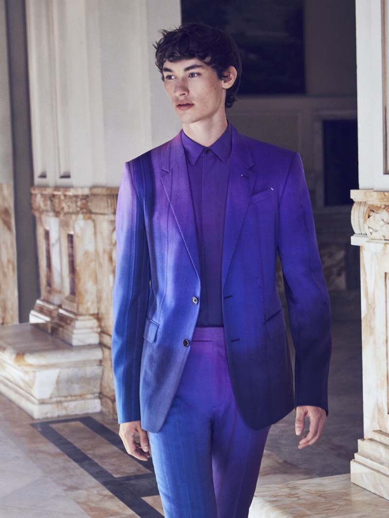 Dylan Li Lagain wears a stunning purple suit with a silk shirt for Berluti's fall-winter 2021 campaign.