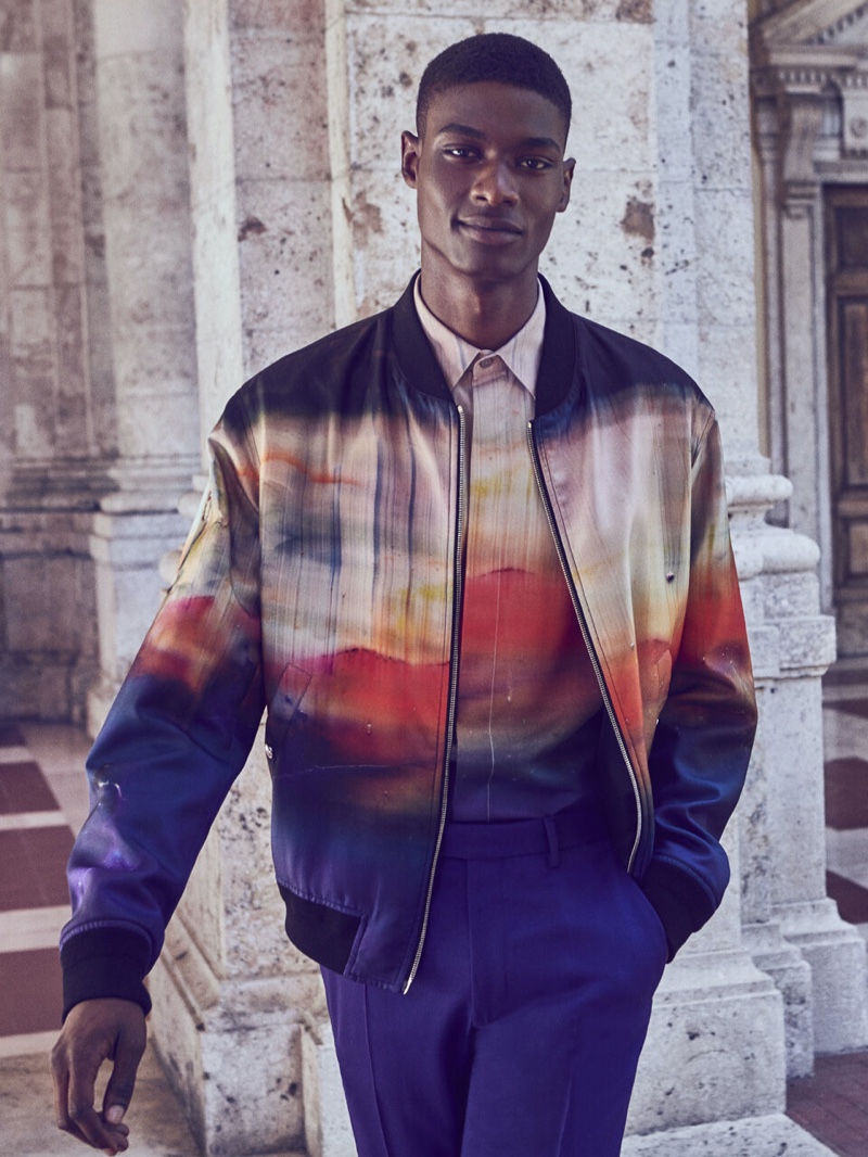 Rachide Embaló wears a matching bomber jacket and shirt for Berluti's fall-winter 2021 campaign.