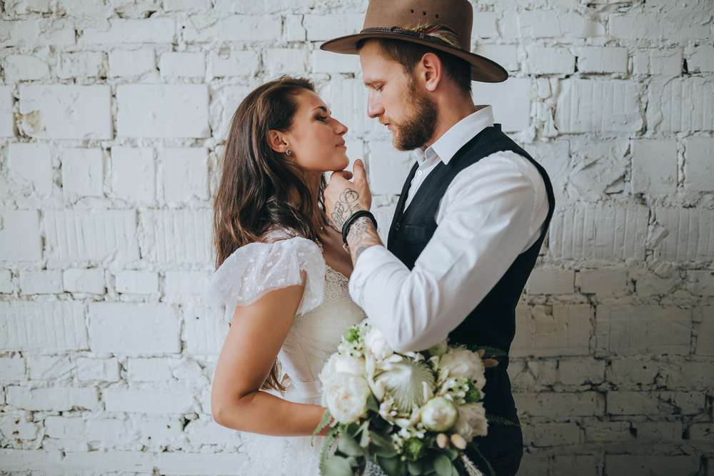 https://www.thefashionisto.com/wp-content/uploads/2021/09/Bohemian-Wedding-Style-Hat-Groom-Vest.jpg