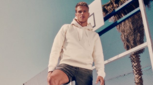 Rocking the brand's white sneakers, Matthew Noszka stars in CCC Sprandi's fall 2021 campaign.