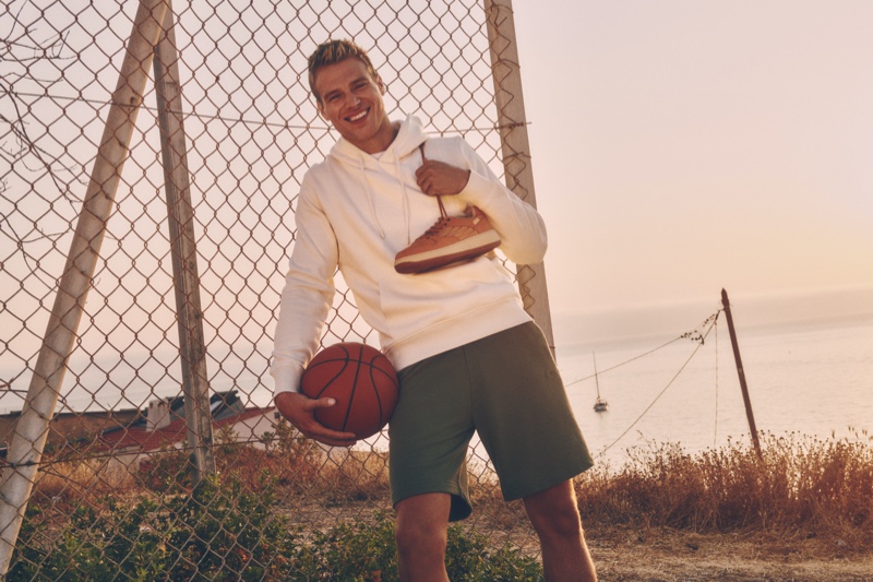 All smiles, Matthew Noszka stars in CCC Sprandi's fall 2021 campaign.