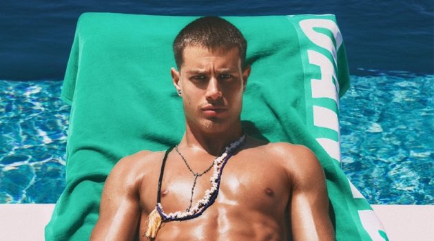 Roberto, Christos & Deano Go Poolside in Dsquared2 Beachwear Working on his tan poolside, Roberto Hoshieh wears a green Dsquared2 swimsuit.