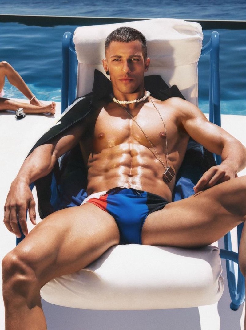 Greek model Christos Katsavochristos fronts Dsquared2's beachwear campaign.