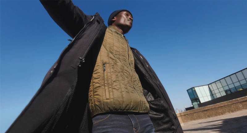 At peace, Dennis Nyero stars in Esprit's fall-winter 2021 men's campaign.