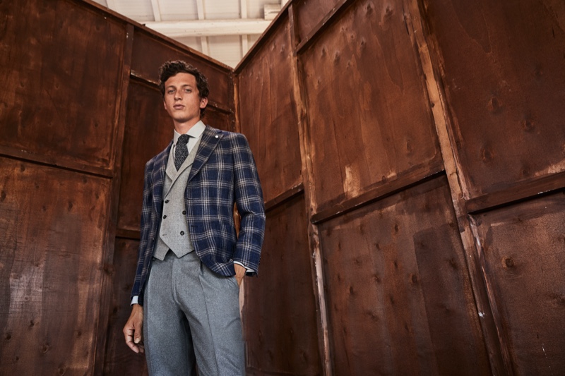 Embracing dapper style, Alexis Maçon-Dauxerre wears a fall look from Luigi Bianchi Mantova.