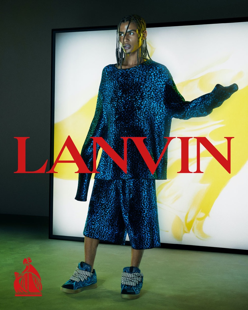 French rapper Luv Resval wears CO-ORD pieces for Lanvin's fall-winter 2021 men's campaign.