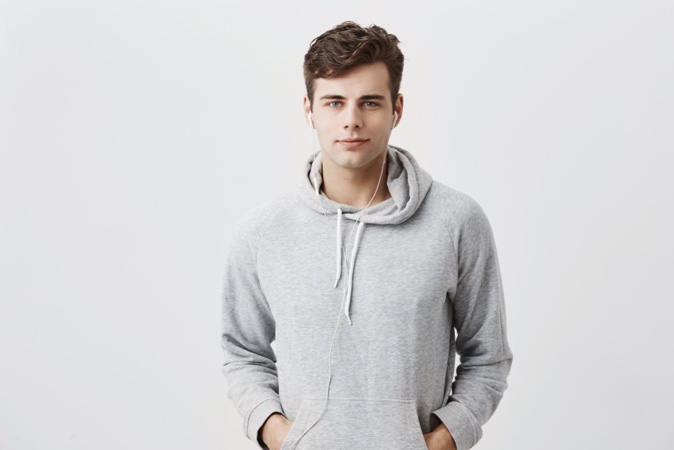 Male Model Ear Buds Grey Sweatshirt