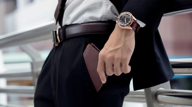 8 Features to Look for When Shopping for the Best Wallets for Men Man Putting Wallet in Pocket
