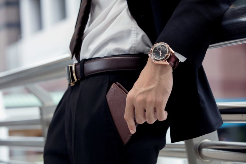 Man Putting Wallet in Pocket