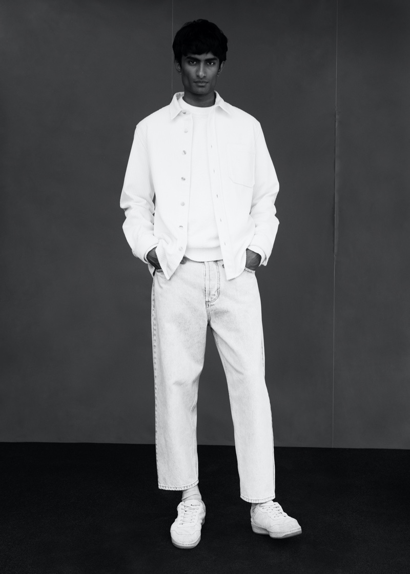 In front and center, Rishi Robin sports an all-white look from Mango.