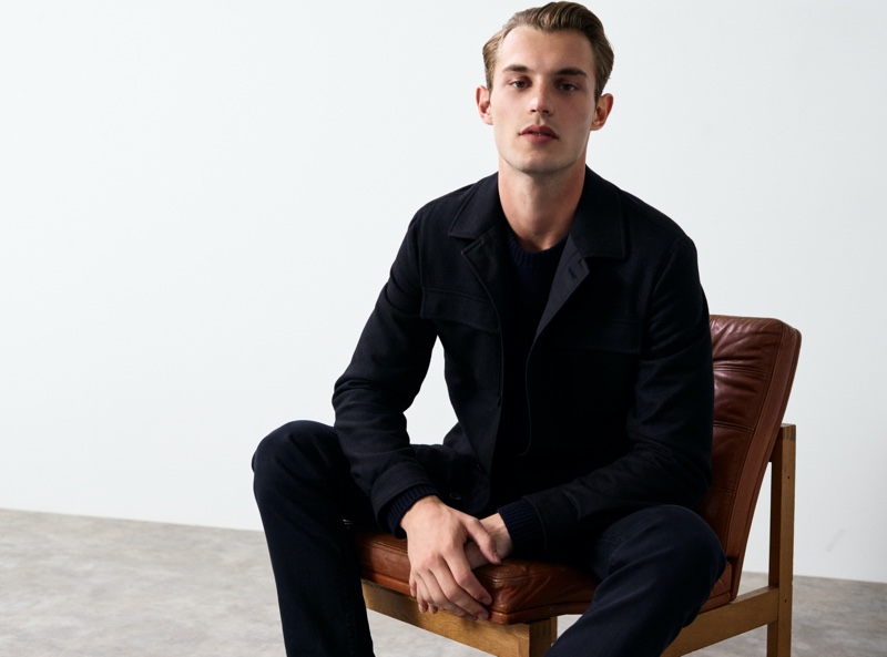 Modeling a Massimo Dutti look from its Join Life collection, Kit Butler showcases an overshirt with a wool-cashmere sweater and slim-fit jeans.