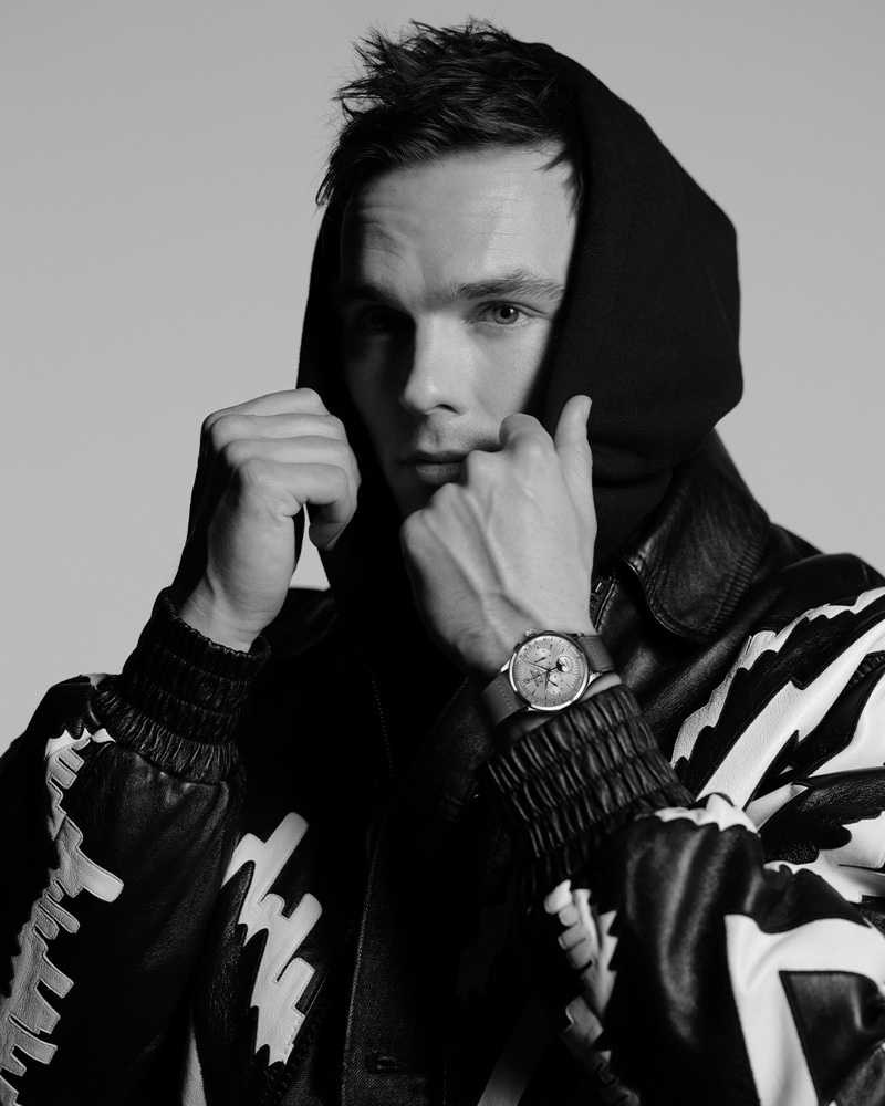 Nicholas Hoult dons Jaeger LeCoultre's Master Control Chronograph Calendar watch.