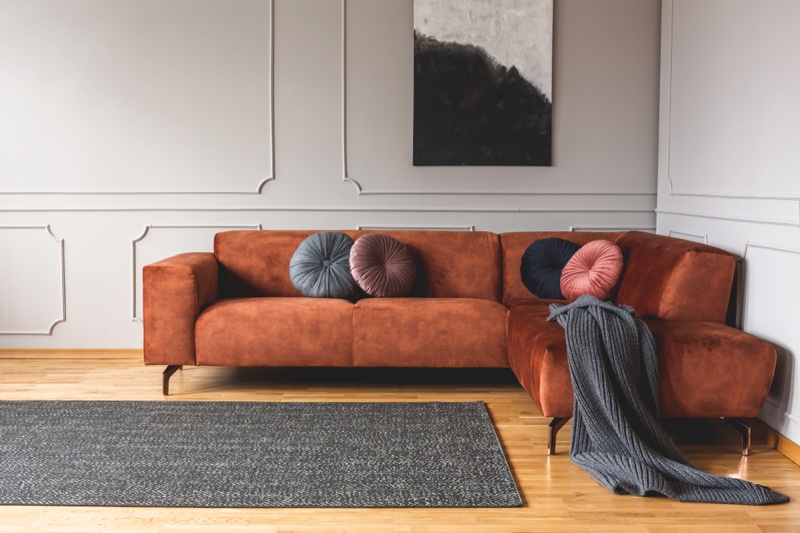 Orange Couch Art Rug Round Pillows Home