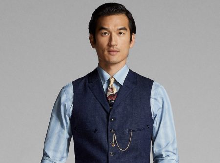 Tony Chung wears a notch-lapel denim vest with matching pants from Ralph Lauren Double RL.