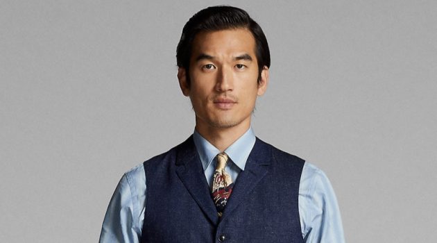 Tony Chung wears a notch-lapel denim vest with matching pants from Ralph Lauren Double RL.