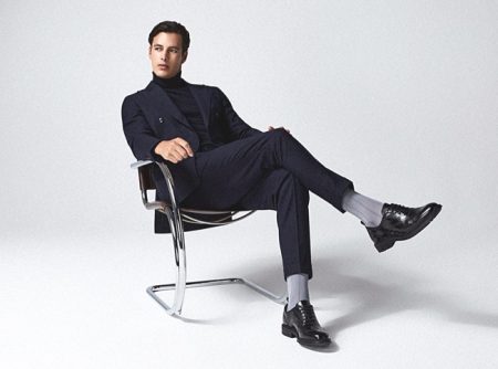 Dressed to impress, Harry Gozzett rocks Reiss' Nether suit with a Cain turtleneck.