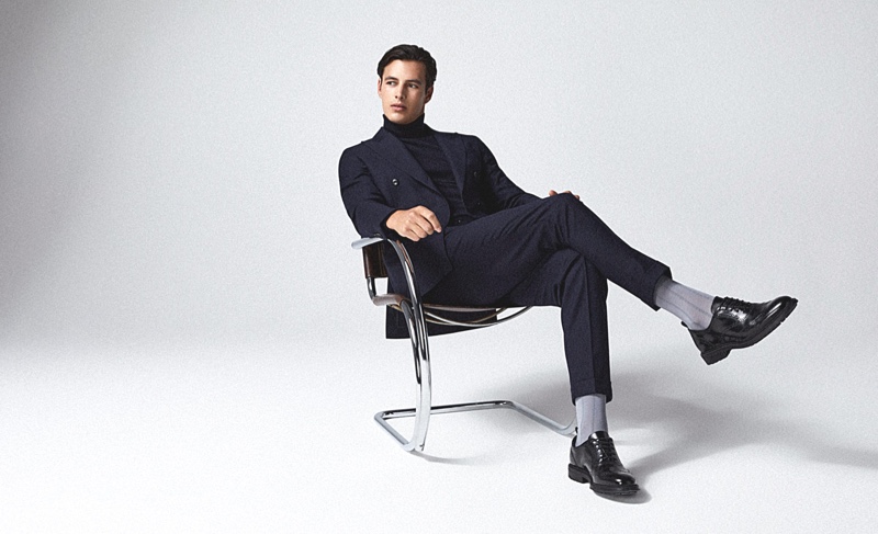 Dressed to impress, Harry Gozzett rocks Reiss' Nether suit with a Cain turtleneck.