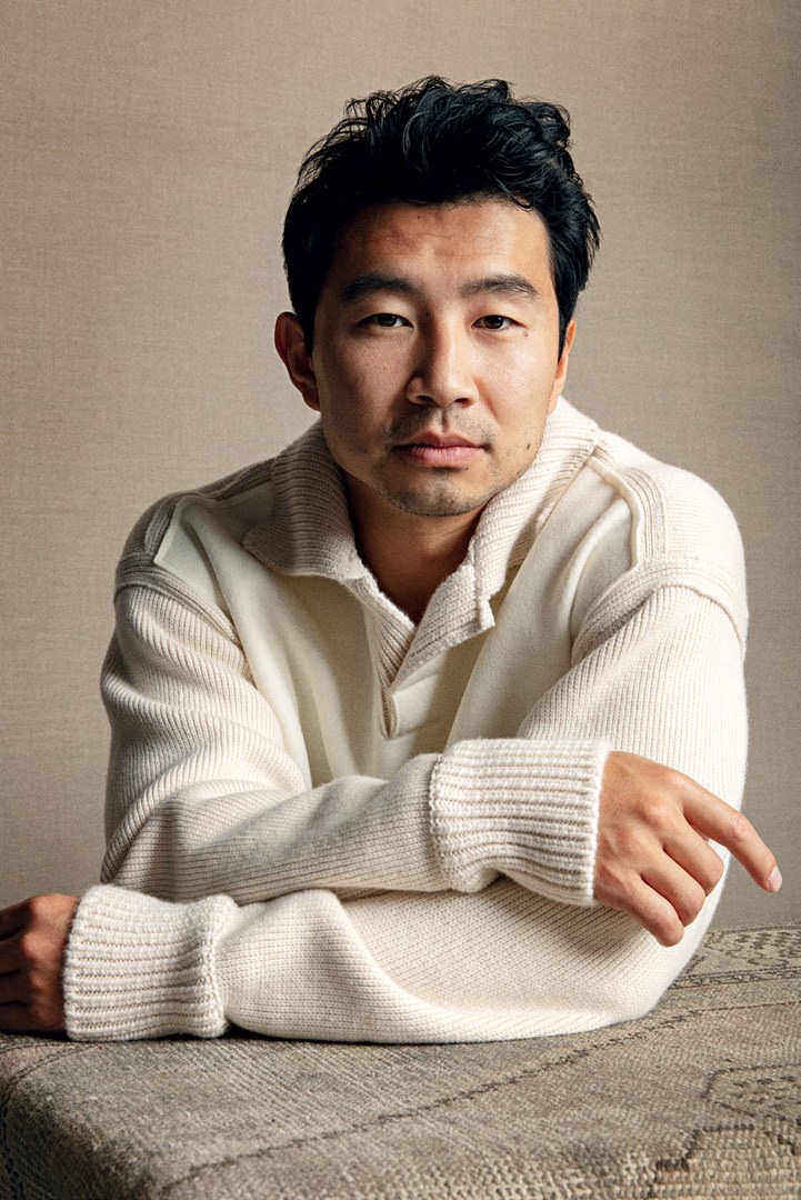 In front and center, Simu Liu sports a polo sweater by Zegna for Esquire Singapore.