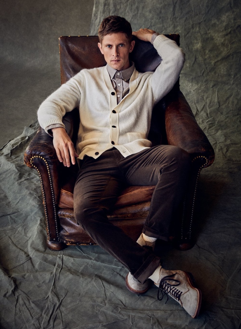 Dressed smartly head to toe, Mathias Lauridsen charms in a cashmere cardigan by Todd Snyder.