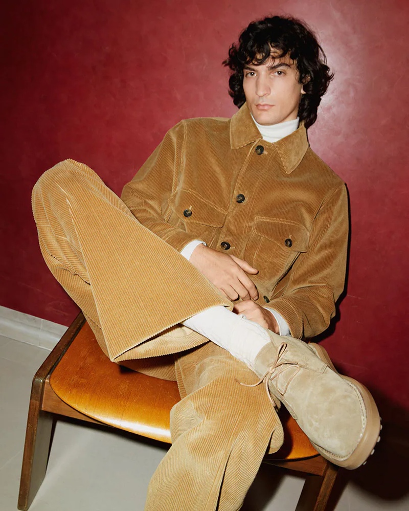 Luca Lemaire dons a corduroy look and wears desert boots for Tod's fall-winter 2021 men's campaign.