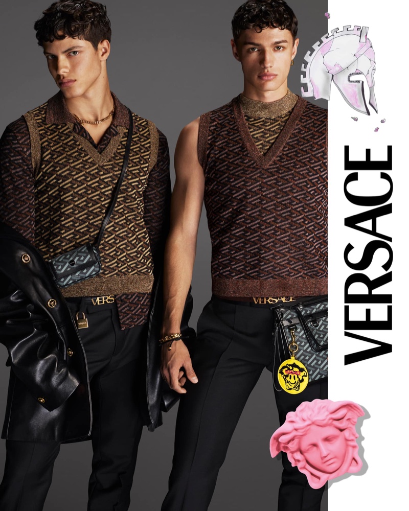 Embracing amsrt style in chic sweater vests, Nacho Penín and Ondrej Mokoš front Versace's fall 2021 men's campaign.