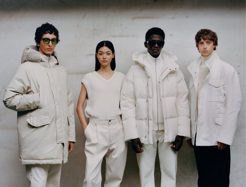 Sporting white and off-white clothing, Takfarines Bengana, Mika Schneider, Moustapha Sy, and Chester Mckee model Zara's Origins collection.