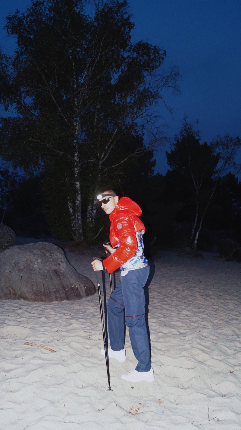 Pictured outdoors, Erwan Filidori wears a unique look from Colmar A.G.E.'s fall-winter 2021 collection.