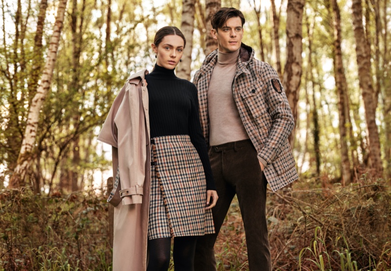 Wearing his 'n' her looks, models Lewis Jamison and Sophia Roberts appear in Daks' fall-winter 2021 campaign.