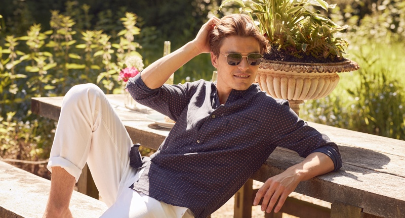 A sleek vision, Oliver Cheshire models an Italian linen shirt from Derek Rose. 