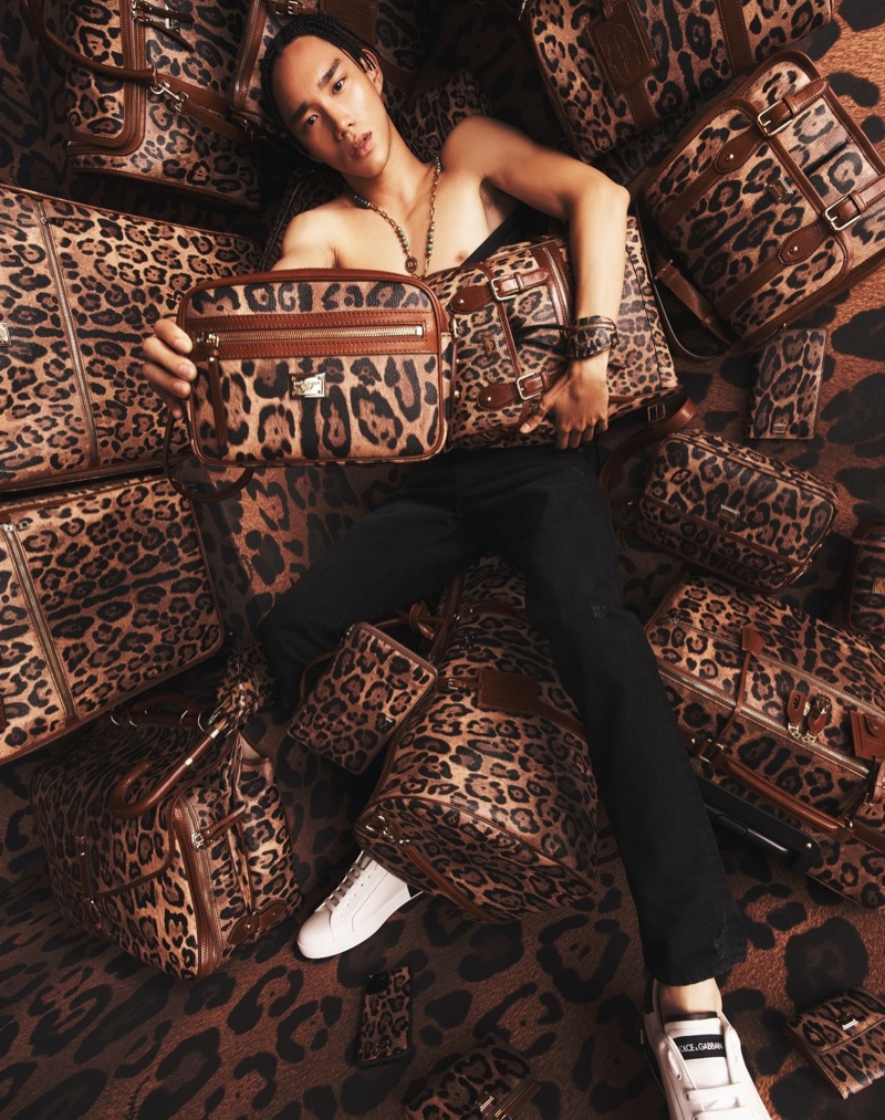 Marcelo Zhang poses with leopard print bags from Dolce & Gabbana's Crespo Leo collection. » Dolce & Gabbana Revisits Leopard with Crespo Leo Collection Marcelo Zhang poses with leopard print bags from Dolce & Gabbana's Crespo Leo collection.