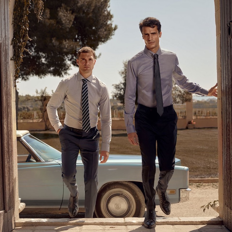 The faces of Hockerty's fall-winter 2021 collection, Stefan Pollmann and Alexander Ardid wear smart shirts, ties, and trousers.