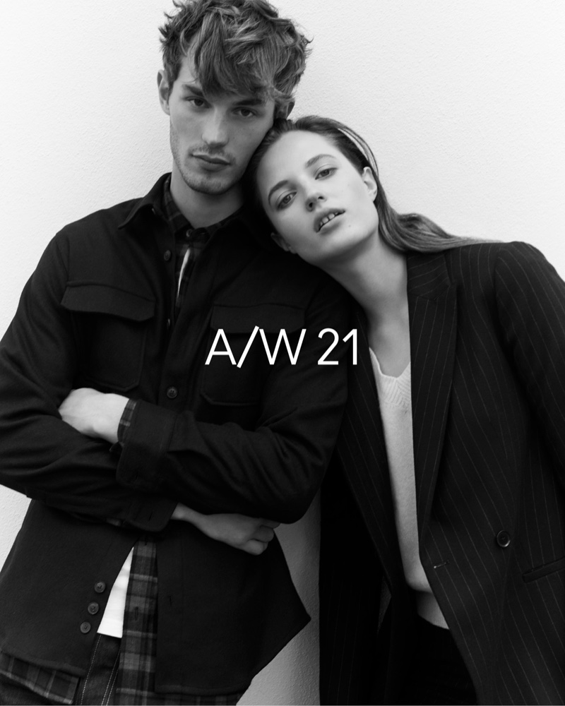 Models Kit Butler and Julia Banas come together in fall tailoring from Jaeger.