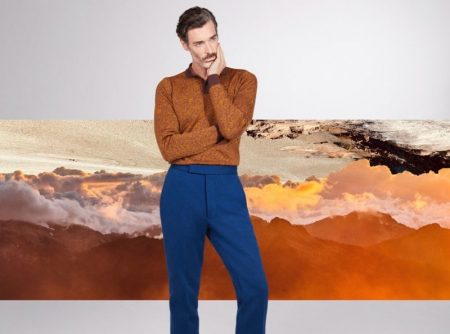 Richard Biedul dons a long-sleeve knit polo from John Smedley's fall-winter 2021 collection.