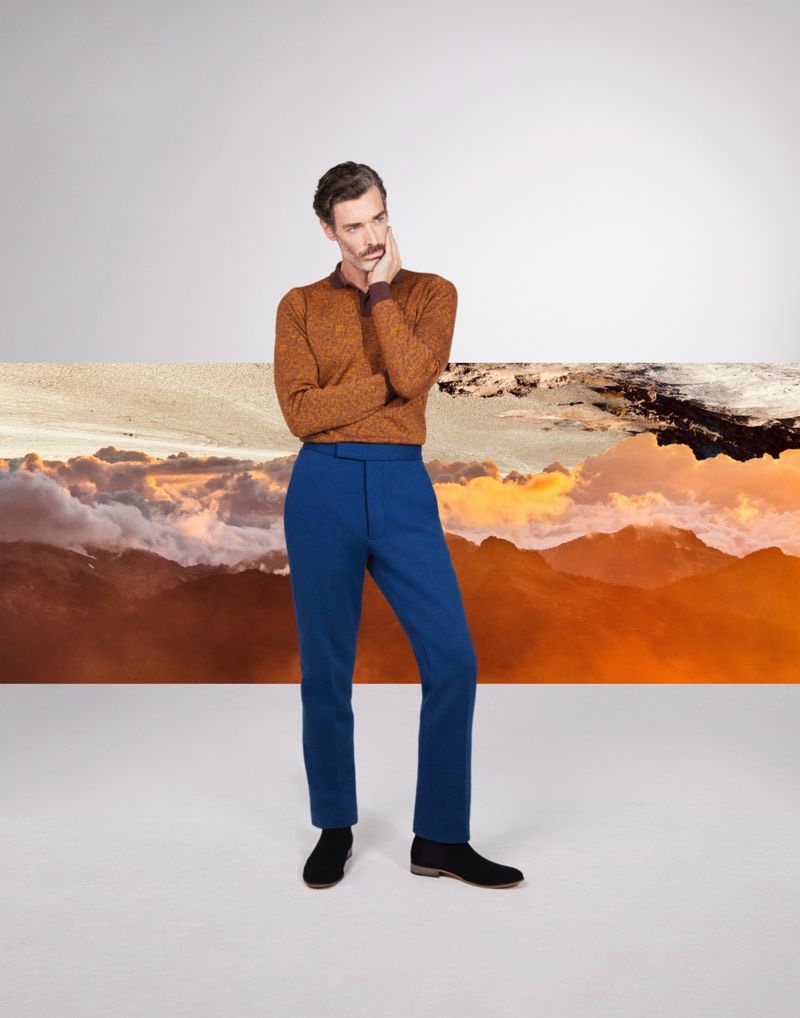 Richard Biedul dons a long-sleeve knit polo from John Smedley's fall-winter 2021 collection.