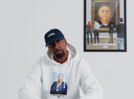 Actor J.B. Smoove sports a hoodie from the Kith x HBO Curb Your Enthusiasm capsule collection.