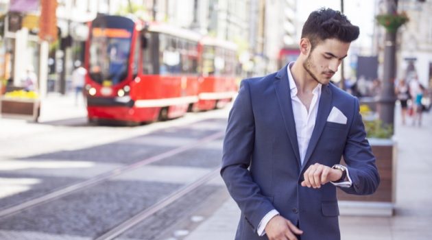 Here Is How You Can Easily Buy Men Suits Online Man Blue Suit Looking Away Street