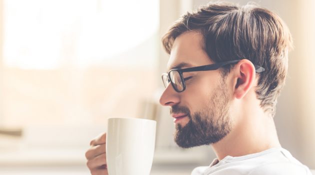 Take a Break: 5 Tips to Enjoy the Best Coffee at Home Man Drinking Coffee at Home