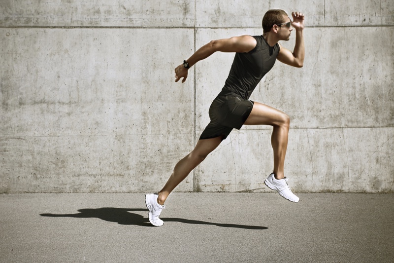 Man Running White Sneakers Pose