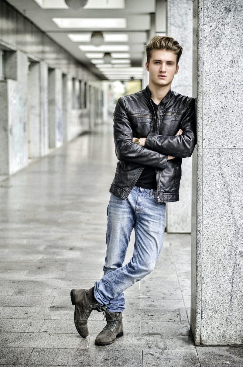 Man Wearing Leather Jacket and Straight Cut Jeans