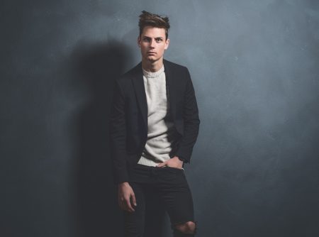 Man in Black Jeans Blazer and Sweater
