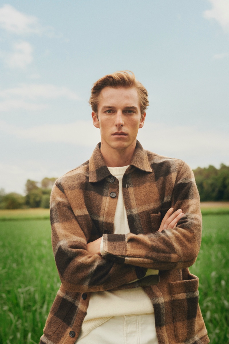 In front and center, Quentin Demeester wears a plaid shirt jacket for Mango's Committed to the Future campaign.
