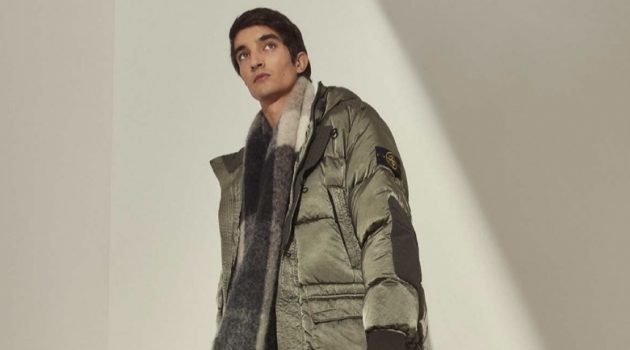 Pablo Fernandez Bundles Up in Winter Essentials from Mytheresa Bundling up for winter, Pablo Fernandez models a Stone Island nylon raso down-TC jacket with an Acne Studios alpaca-blend checked scarf, Bottega Veneta BV tire leather boots, and a Canada Goose sweater.