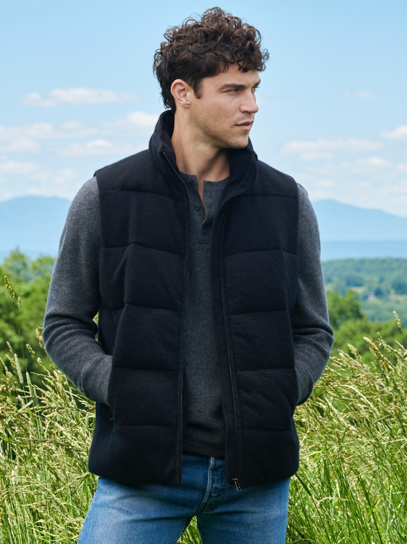 Miles McMillan stays warm in a puffer vest and henley for NAKEDCASHMERE's fall 2021 campaign.