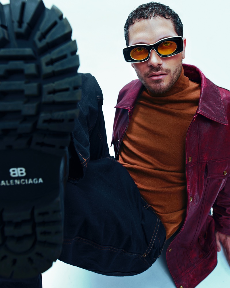 Pedro wears jacket Velez, pants Jacquemus, sweater Zegna, boots Balenciaga, and sunglasses Loewe.