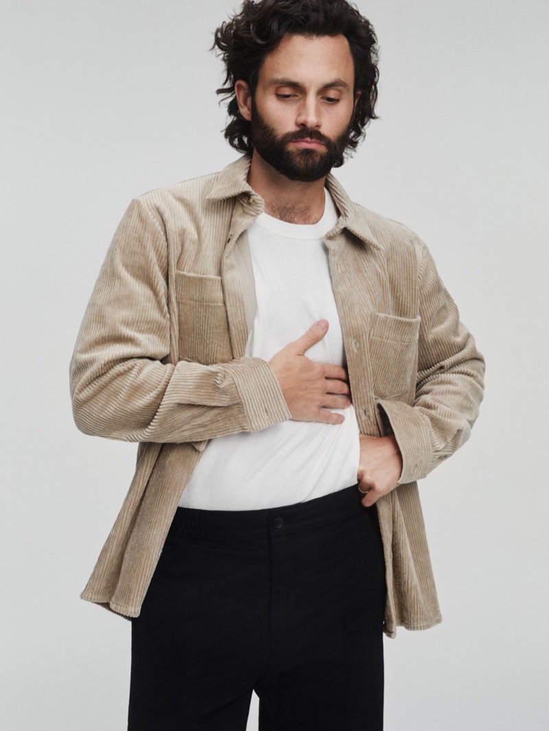 In front and center, Penn Badgley wears an A.P.C. cotton-corduroy shirt, Bottega Veneta t-shirt, and Acne Studios trousers for Mr Porter.