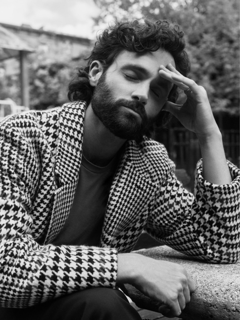 Actor Penn Badgley wears a Mr P. Prince of Wales checked wool overcoat and Sunspel t-shirt for Mr Porter.