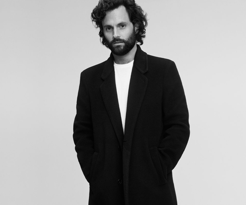 Penn Badgley dons a Mr P. cashmere coat, Tom Ford shirt t-shirt, and Saint Laurent chinos for Mr Porter.