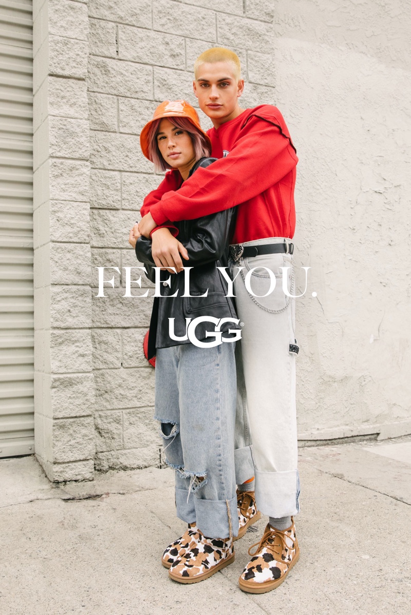 Real-life couple Shanley McIntee and Cameron Porras showcase his 'n' her style in UGG's Classic Ultra Mini Cow Print and Neumel Cow Print for the label's fall-winter 2021 "Feel You" campaign.
